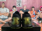 Rear view of black and green Nike basketball sneakers with translucent heel details