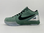 Opposite side profile of the green shoe and clear heel accent