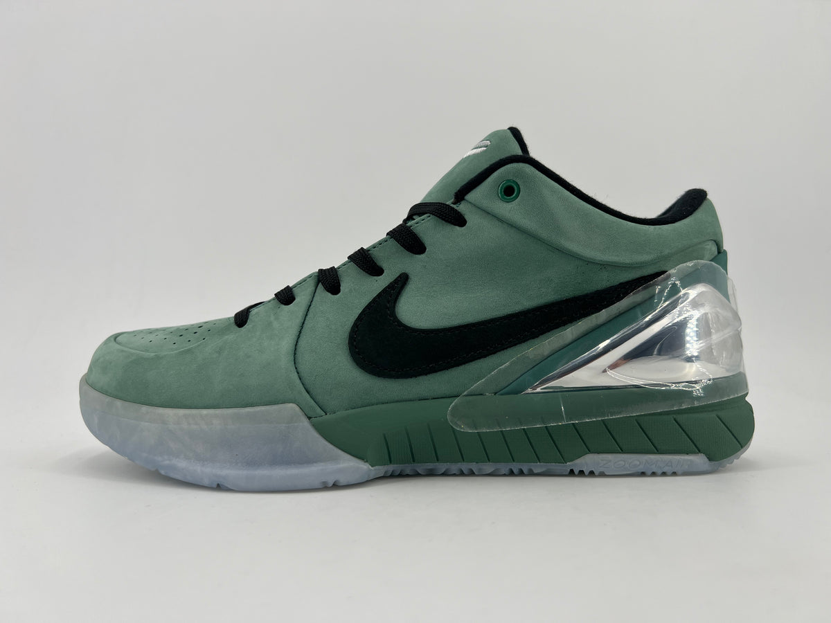 Opposite side profile of the green shoe and clear heel accent