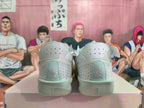 Rear view of light gray Nike basketball shoes with perforated heel panels and pale blue details