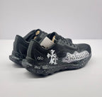 Rear angled view showing heel structure, alo branding and white speckle detailing.