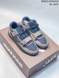 Pair of mocha and dark blue-gray Jordan Jumpman Jack low-top sneakers with forefoot straps