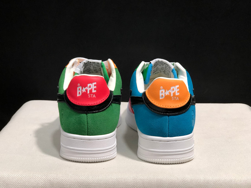 Rear view showing green and blue heel panels with BAPE STA branding.