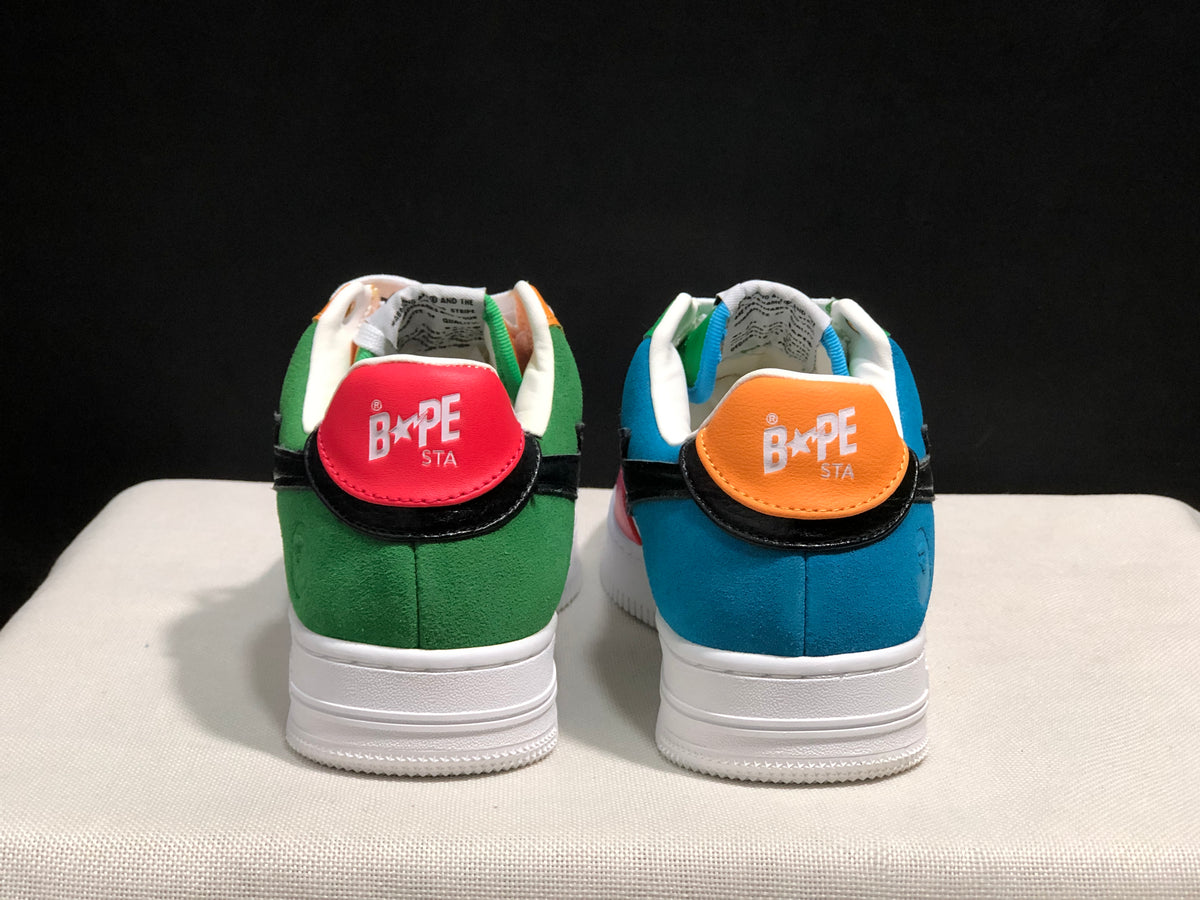 Rear view showing green and blue heel panels with BAPE STA branding.