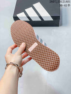 Close-up of the geometric gum-colored outsole on a pink sneaker