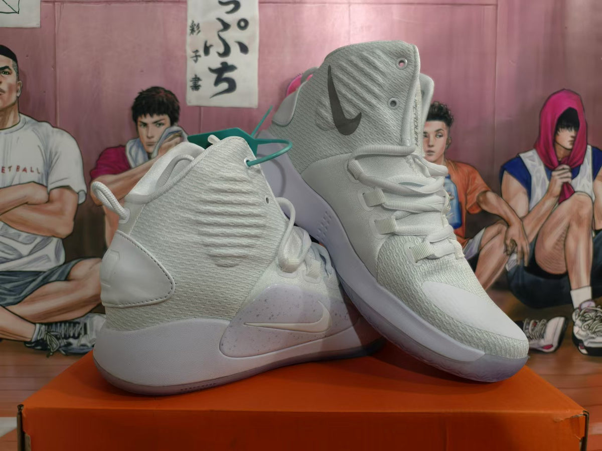 Angled view of the white high-top basketball shoes
