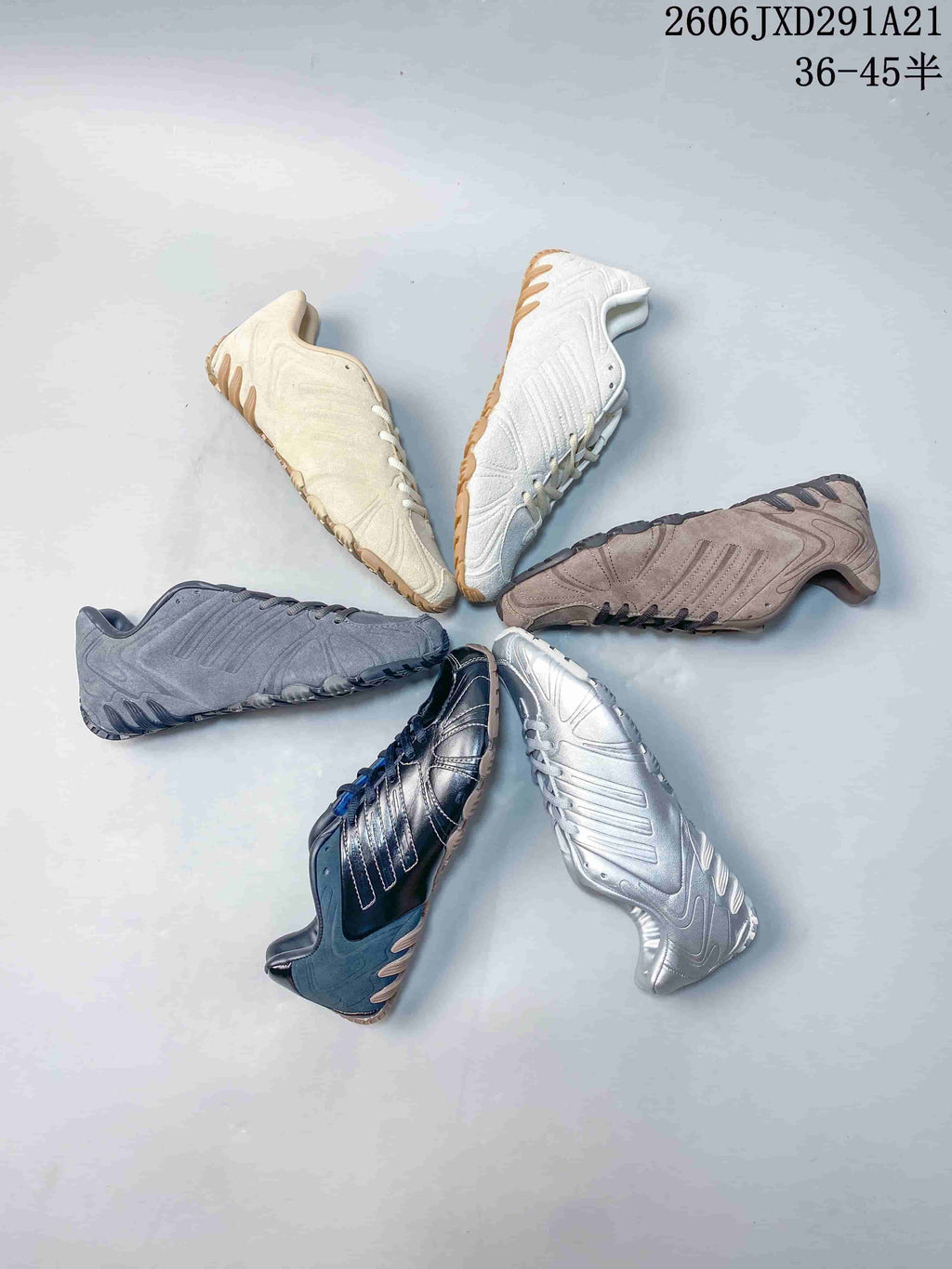 Multiple adidas Ghost Sprint colorways arranged in a circular display, including cream, white, brown, gray, navy and silver.
