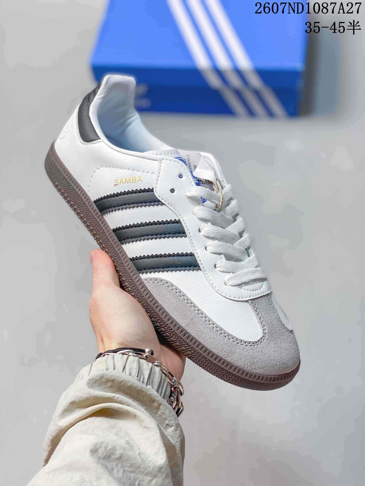 White adidas Samba sneaker with dark stripes and a close view of the low-top profile.