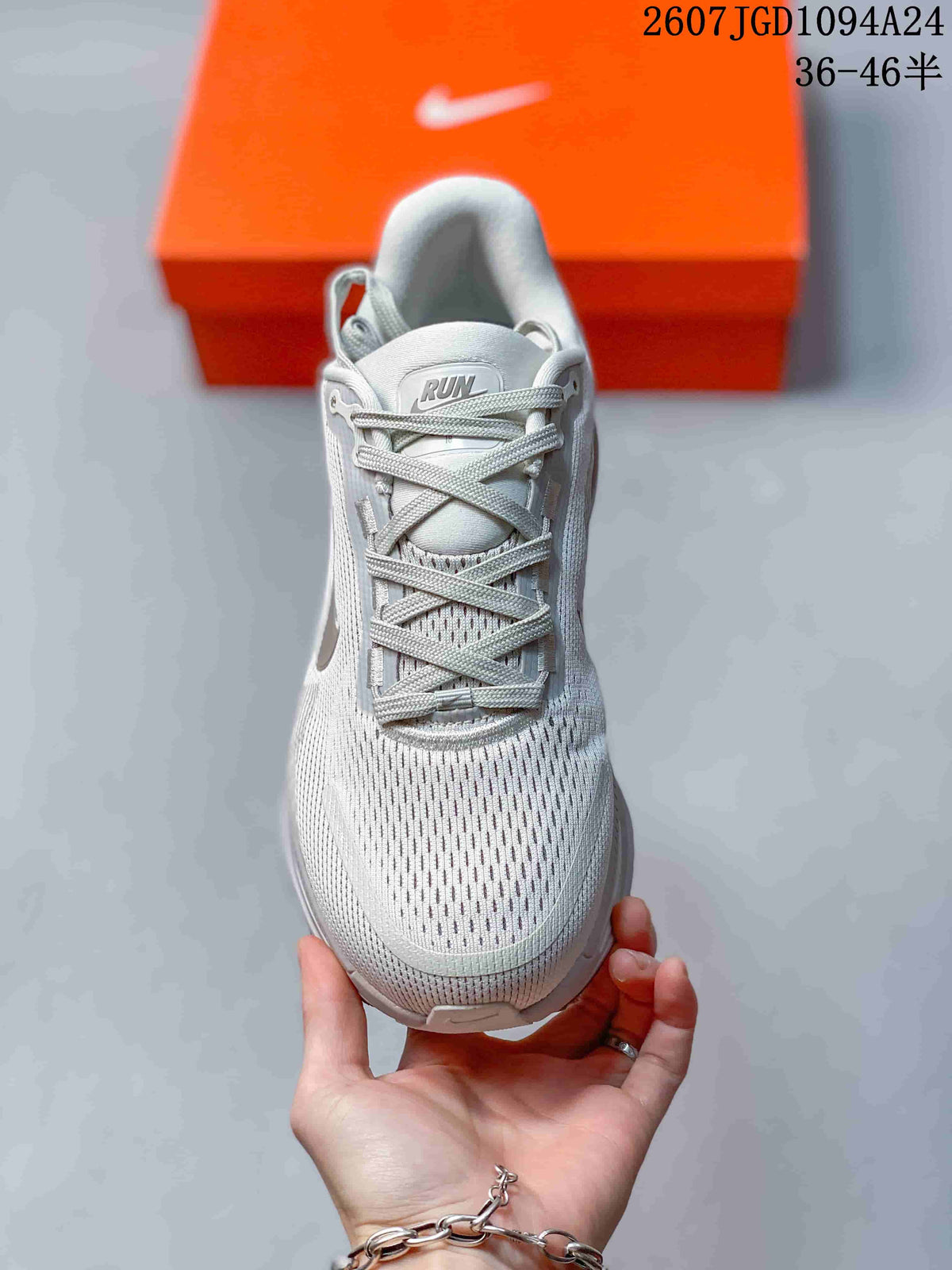 Top view of the sneaker showing the patterned upper, tongue, and crossed laces.