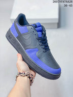 Dark gray and blue Nike Air Force 1 '07 LV8 low-top sneaker shown from the side.