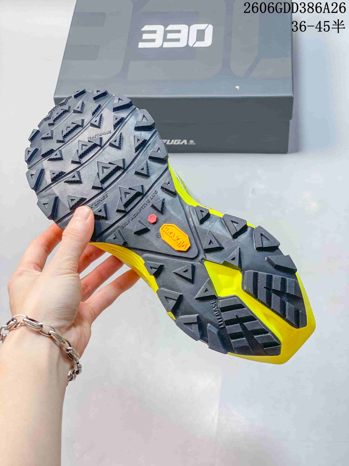 Close-up of the lugged outsole on a Kailas FUGA EX330 trail running shoe