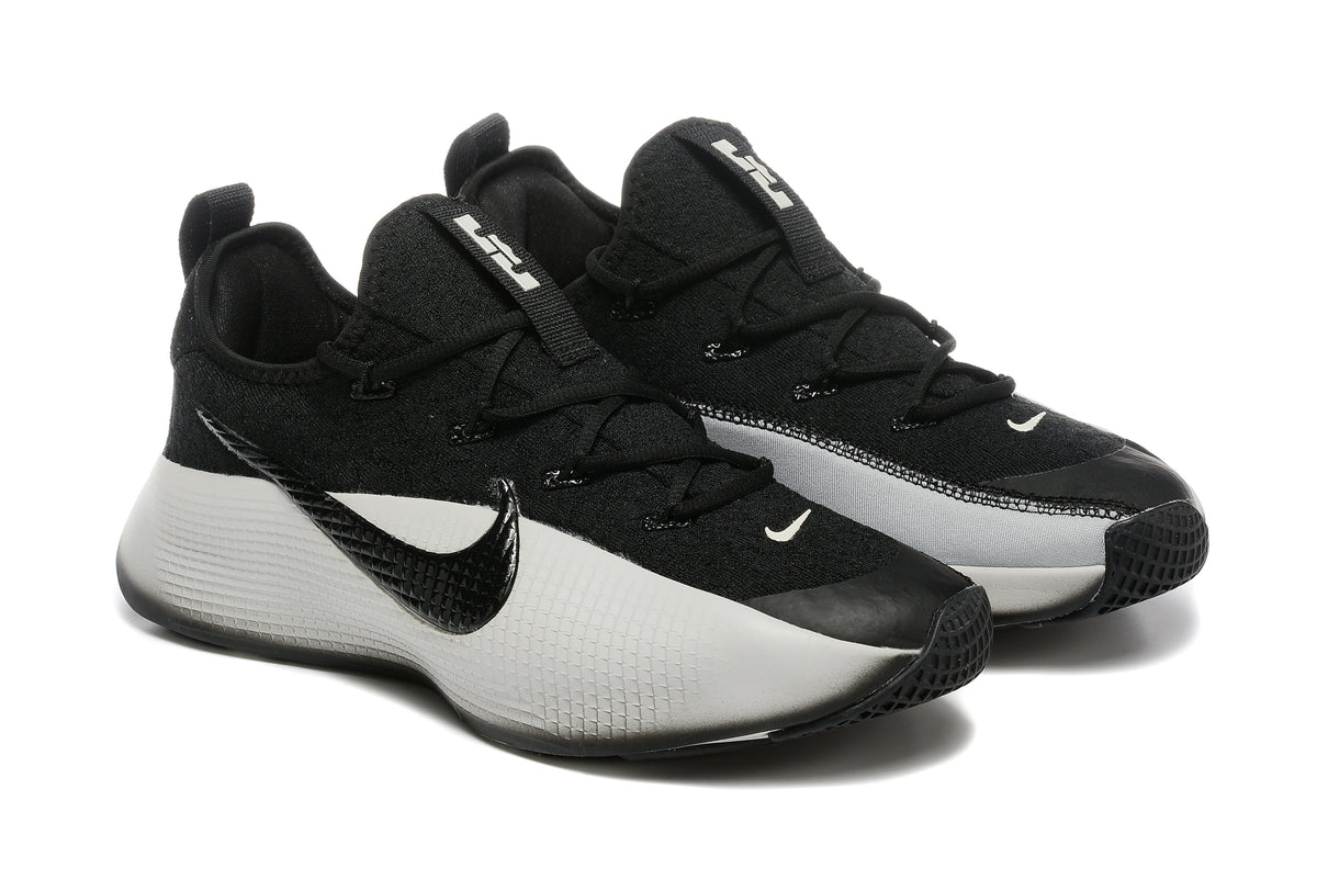 Pair of black and light gray Nike LeBron TR1 basketball shoes
