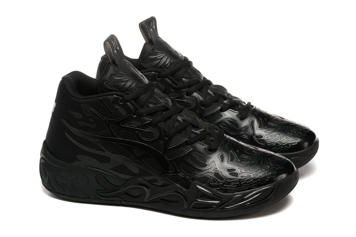 Pair of black PUMA LaMelo Ball MB.02 shoes shown at an angled front-side view.