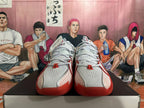 Front view of white and red Nike basketball shoes with gray laces and red toe accents.