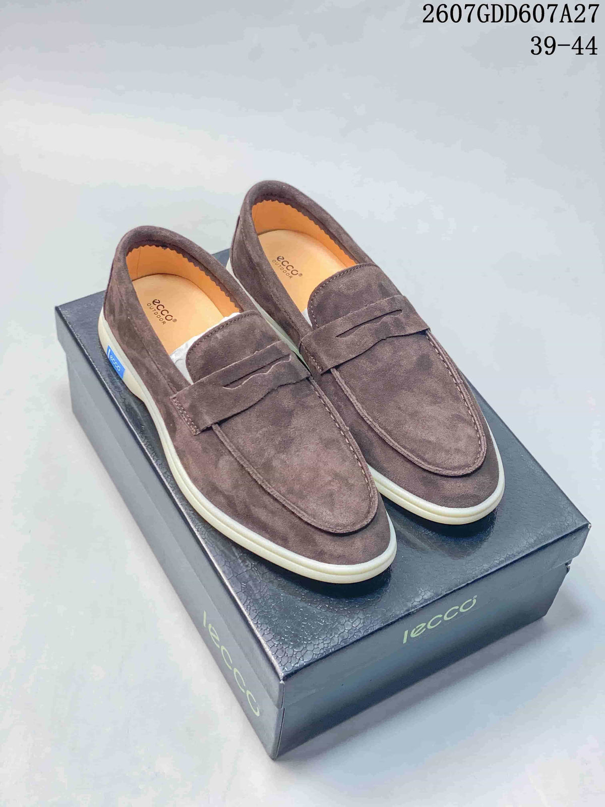 Pair of brown ECCO penny loafers displayed on an ECCO shoe box; the image shows style code 2607GDD607A27 and size range 39-44.