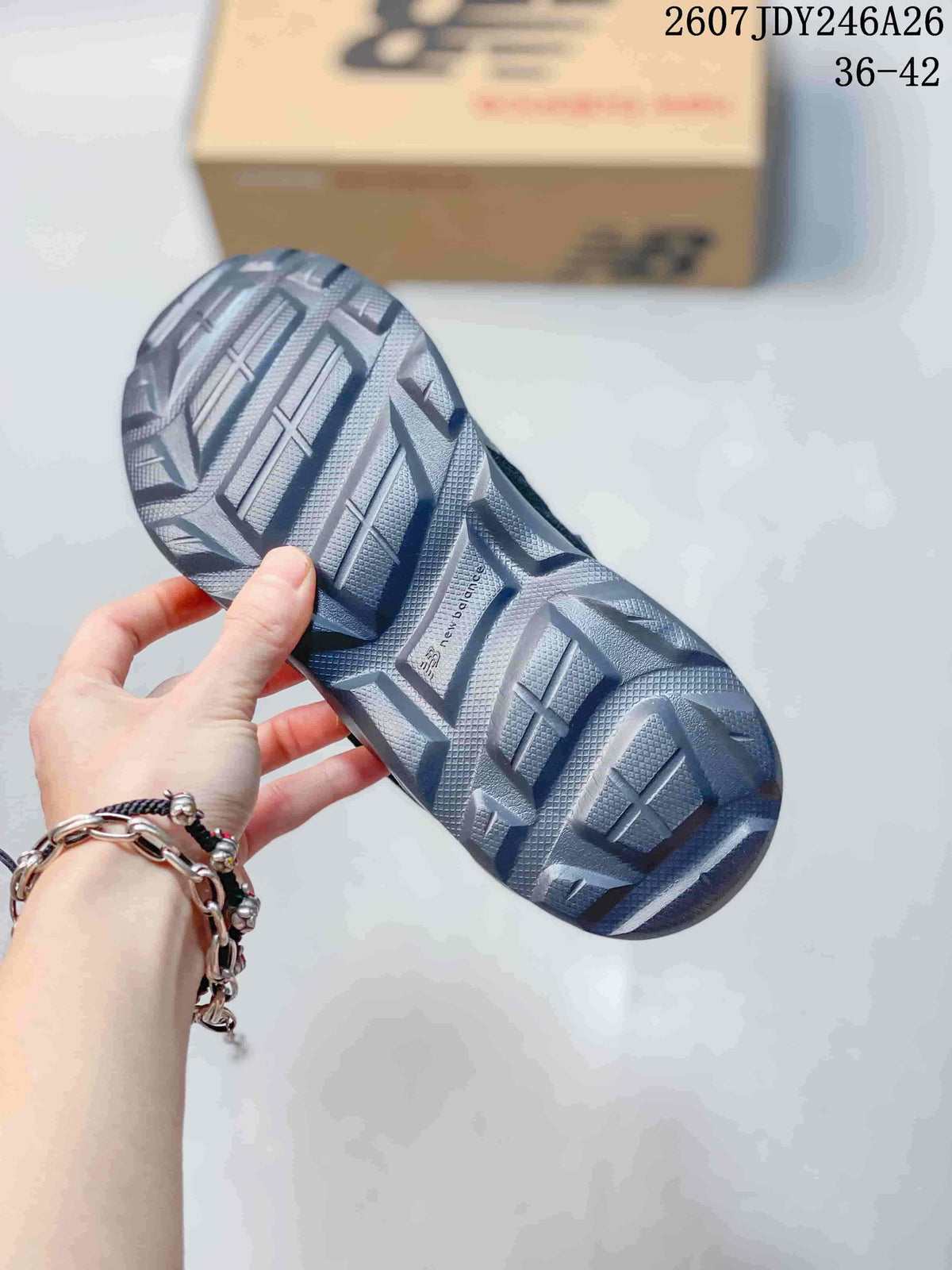 Close view of the sneaker outsole showing a chunky textured tread pattern.