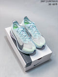 Pair of pale blue Nike running sneakers displayed on a Nike shoebox, with style code 2607JLD978A18 and size range 36–40.5 visible in the upper right.