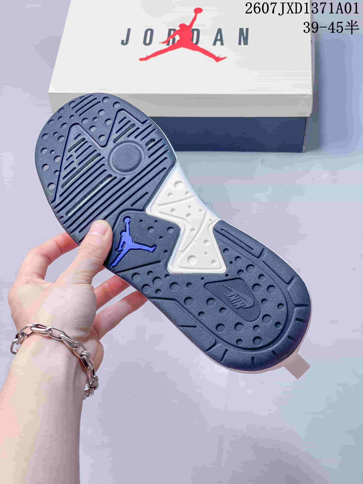 Close-up of the patterned outsole with Jordan branding on a white and silver sneaker.