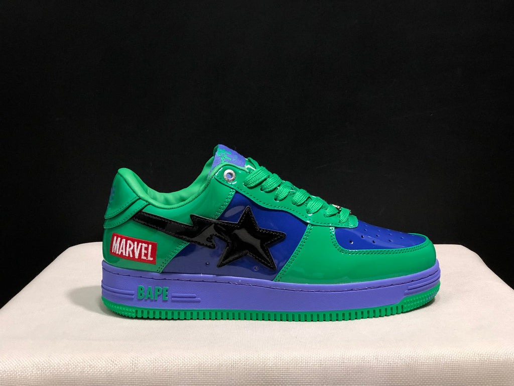 Side view showing the Marvel heel patch, black star-shaped detail, BAPE branding and green outsole.