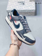 Angled side view of the sneaker showing Nike and The North Face branding, a dark navy and off-white upper, red accents, patterned laces and a dark outsole; product code and a 36–45 size range are overlaid above.