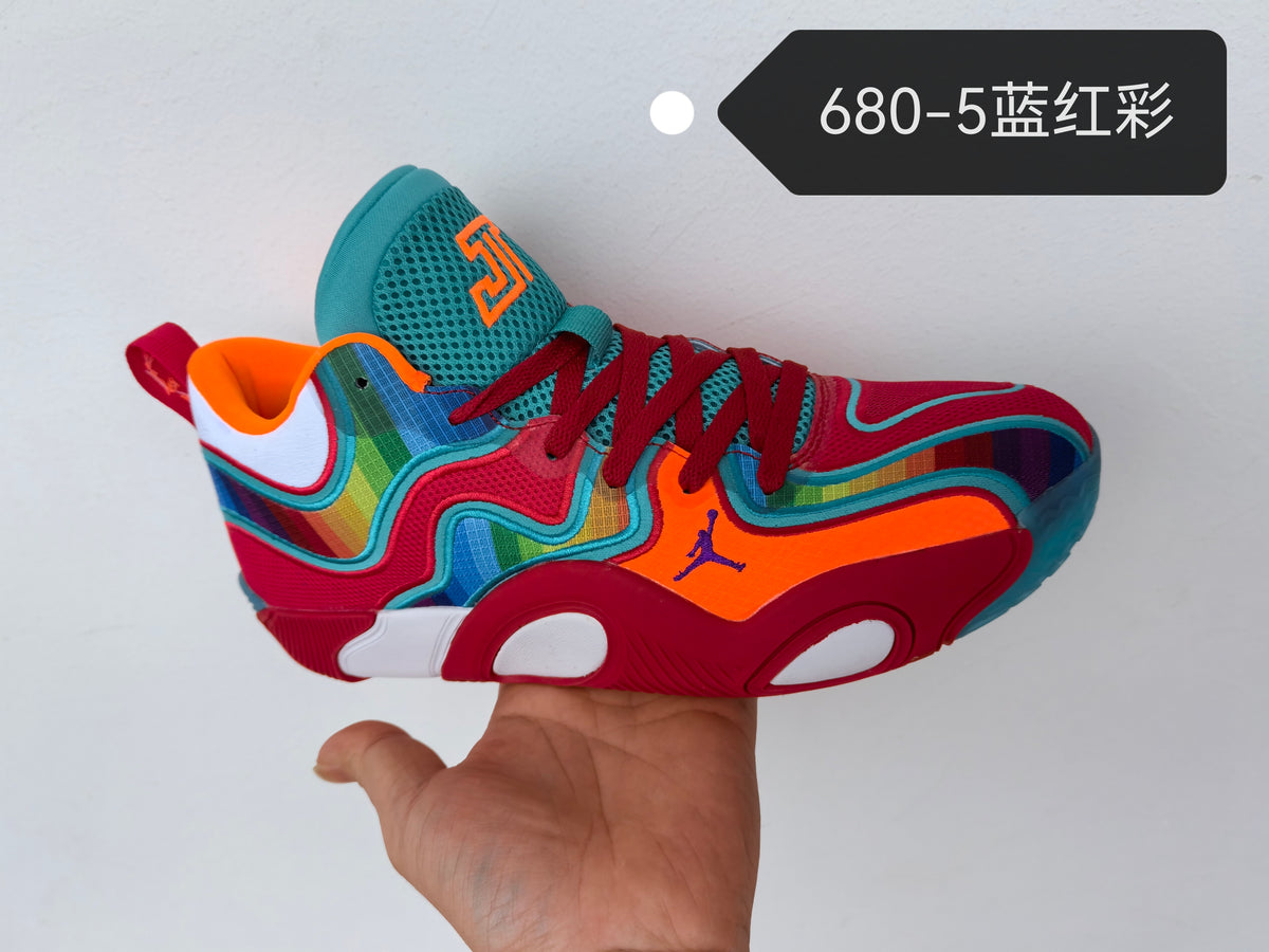 Side profile of the Jordan 680-5 blue, red, and multicolor shoe