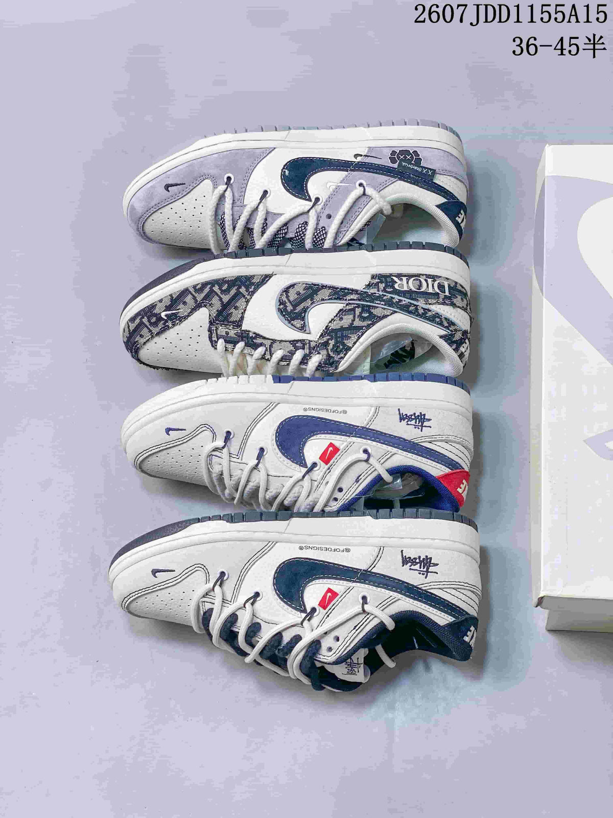 Four low-top sneakers arranged to show the pictured navy, white and gray design variations and their outsoles.