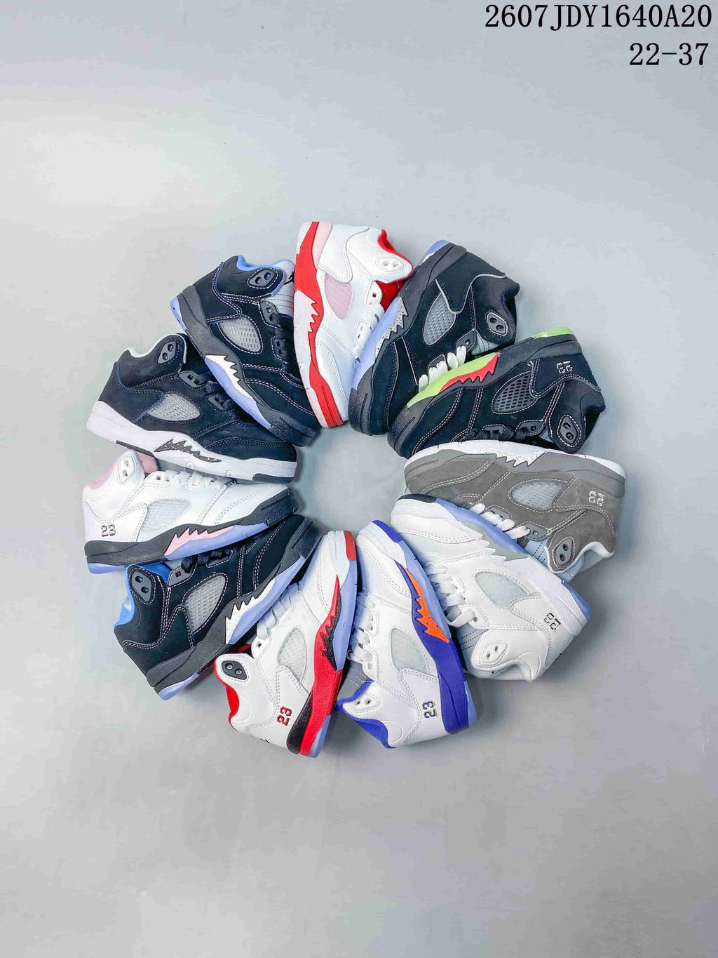 Group view showing multiple color combinations of the kids' mid-top sneaker design.