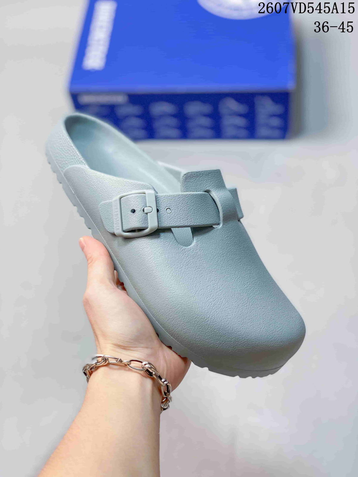 Light blue closed-toe buckle sandal shown at an angled front view.