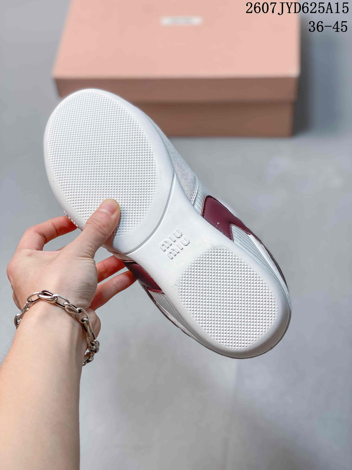 Underside view of a white sneaker showing the textured outsole and embossed Miu Miu branding, with size range 36–45 visible.