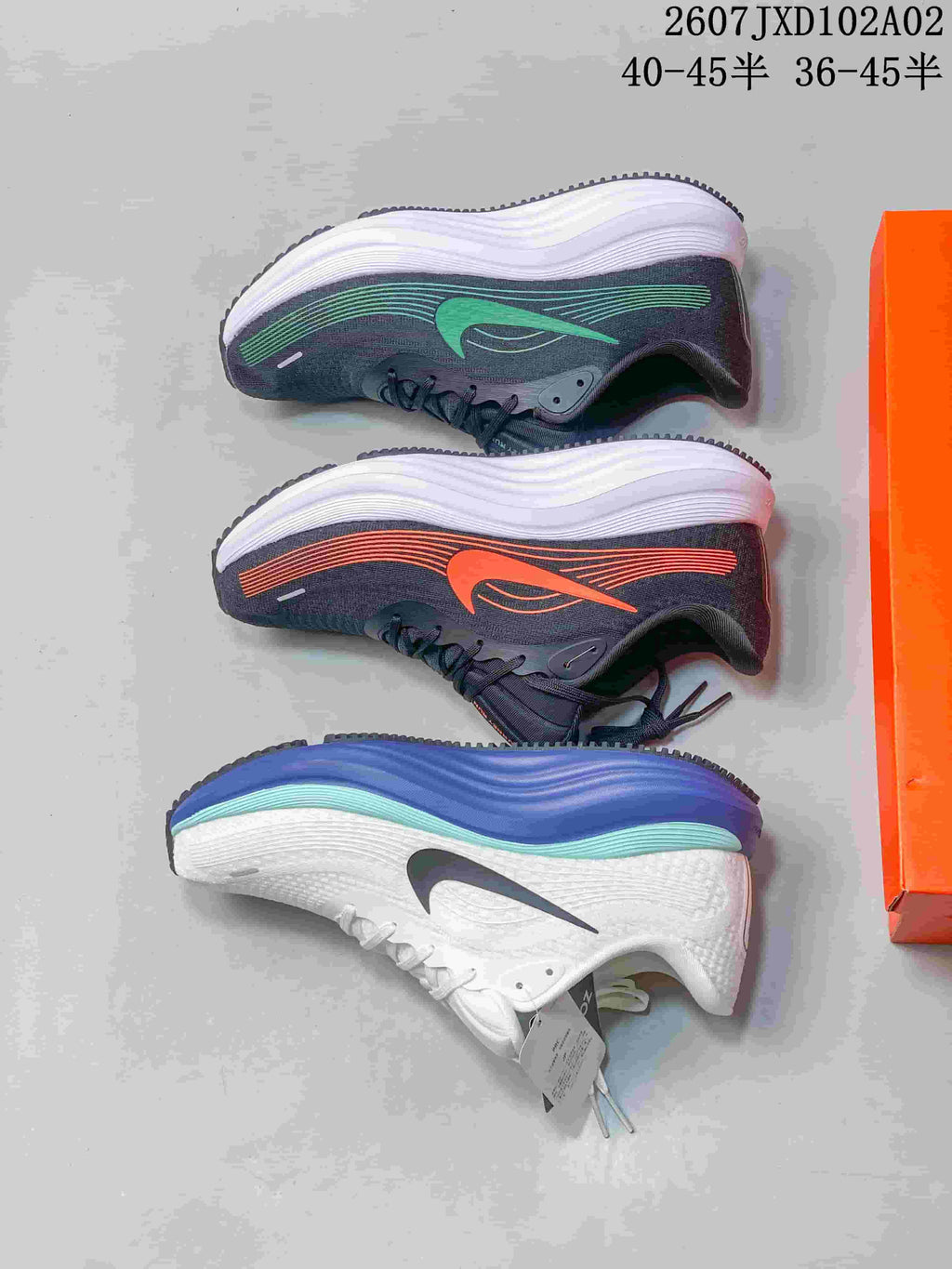 Three pictured colorways of low-top running shoes: charcoal with teal, charcoal with orange, and white with blue-aqua accents