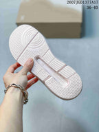 Underside of the sneaker showing a patterned rubber outsole with circular traction detail; style code 2607 JGD1377A17 and size range 36–40 are visible.