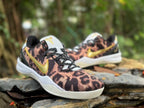 Pair of leopard-print Nike Kobe 8 basketball shoes shown at an angle
