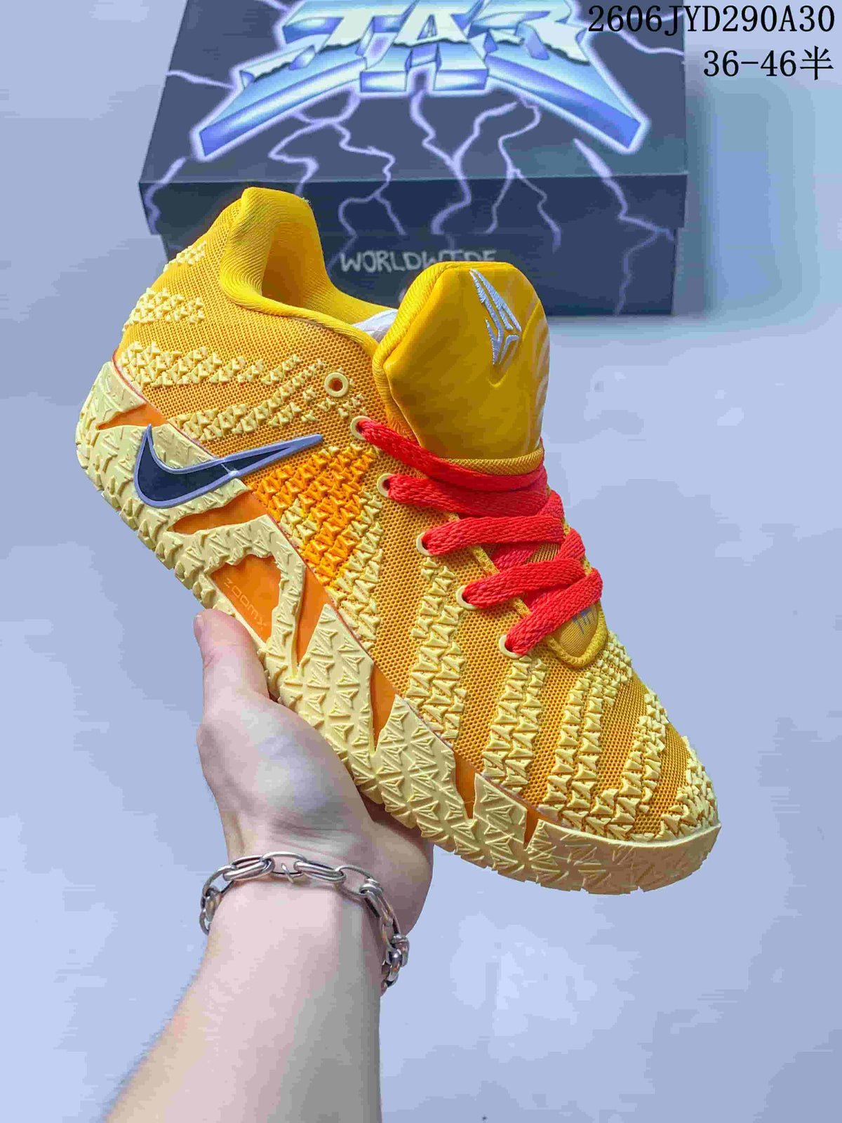 Yellow Nike Ja 3 basketball shoe with red laces and dark side logo