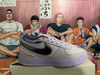 Side view of a gray sneaker with a dark purple Swoosh and purple outsole