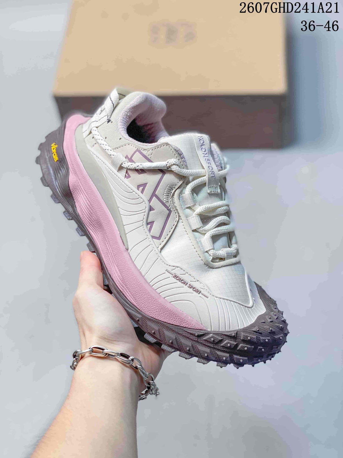 KOLON SPORT LIT CAMP sneaker in white with lavender accents, a pink midsole section and dark tread.