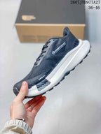 Side view showing the mesh upper, Summit Series branding, Vectiv detailing, and layered sole.