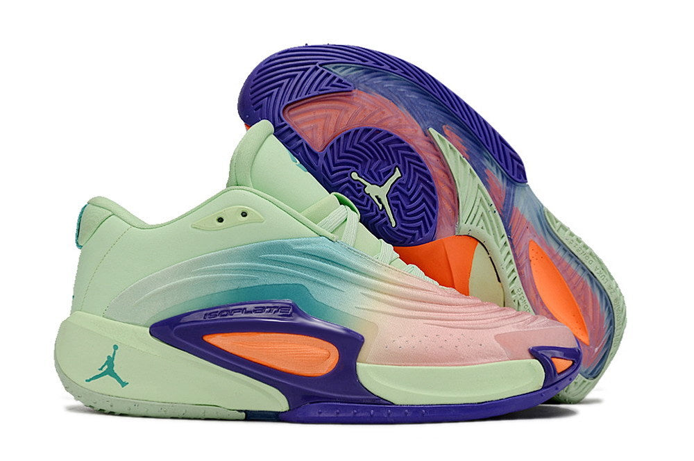 Side profile and outsole of mint green Jordan Luka 3 shoes with purple and orange accents