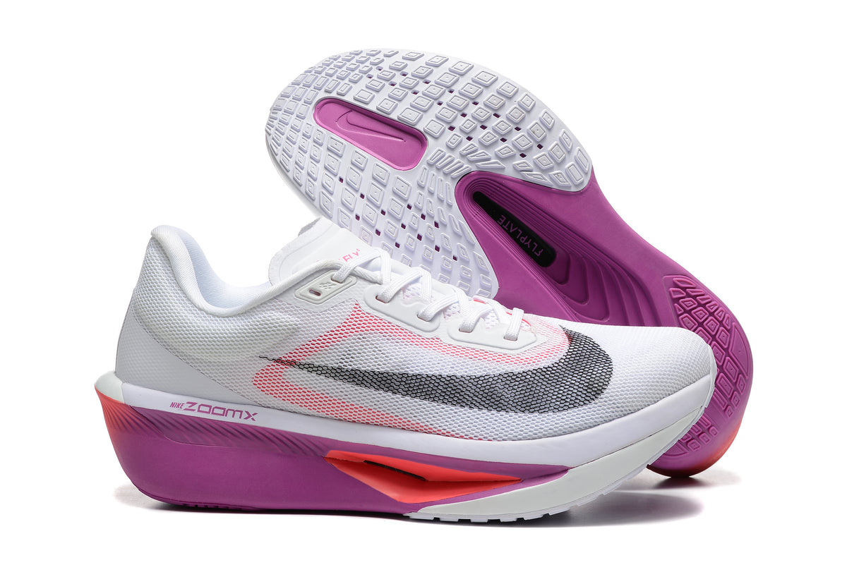 White Nike Zoom Fly 6 side profile with pink-purple accents and patterned outsole