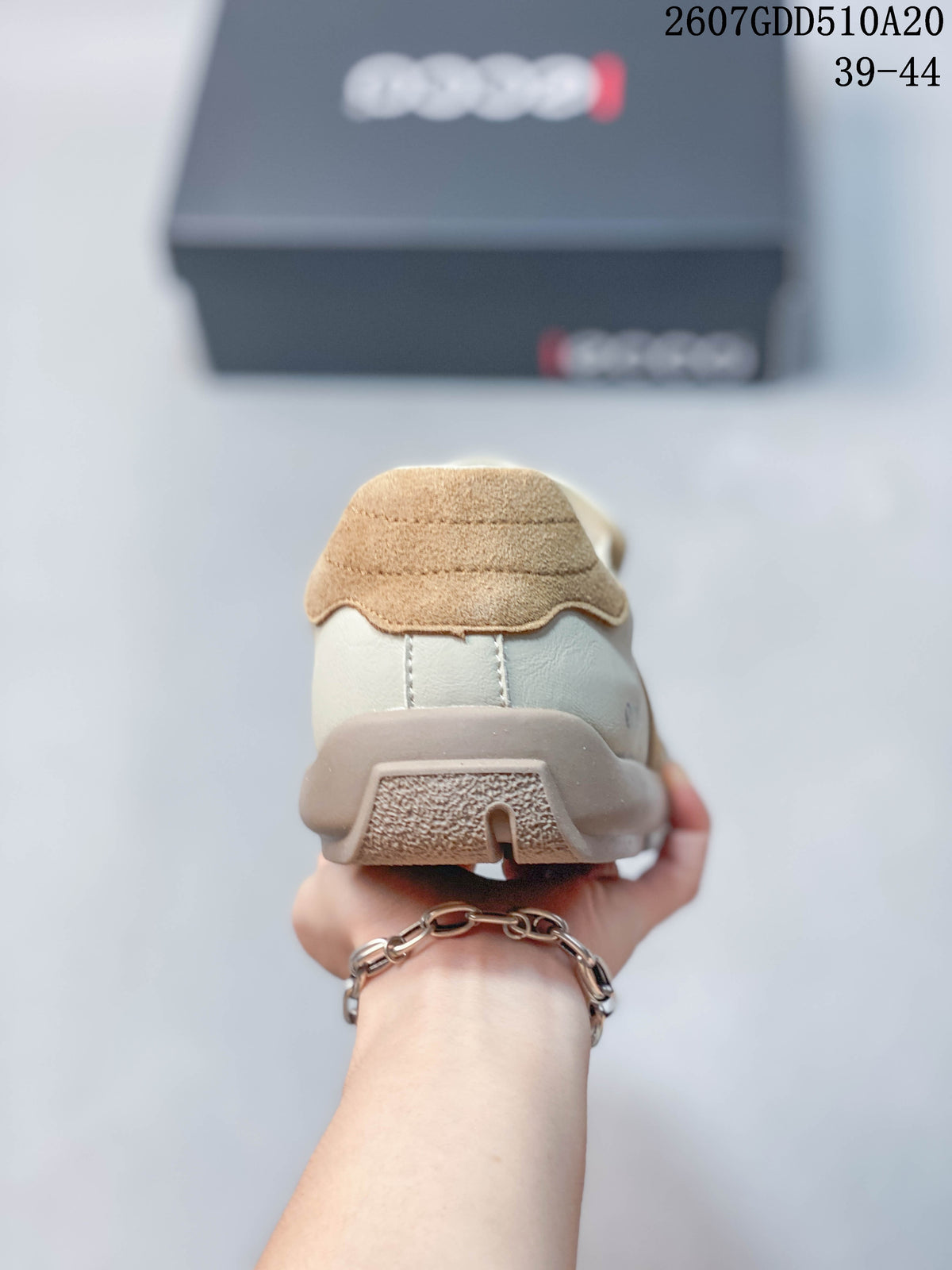 Rear view showing the padded heel collar and layered outsole design.