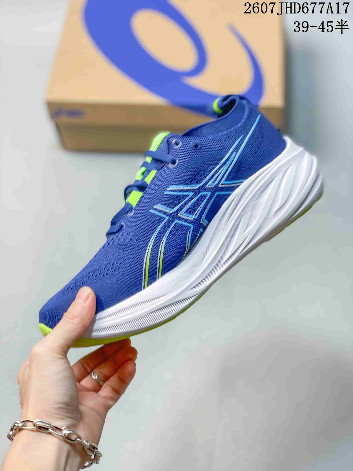 Side profile of the blue running shoe with ASICS branding, bright green accents and a white midsole.