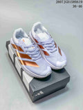 Pair of white adidas training sneakers with metallic copper side accents shown on a shoebox; image text indicates 36–46.