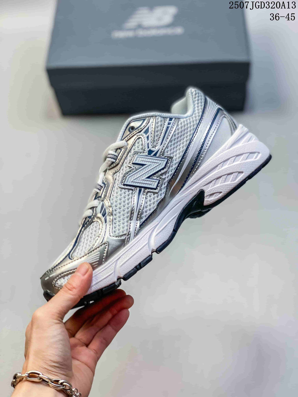 Side profile highlighting the large New Balance branding, mesh-look panels, and layered overlays.