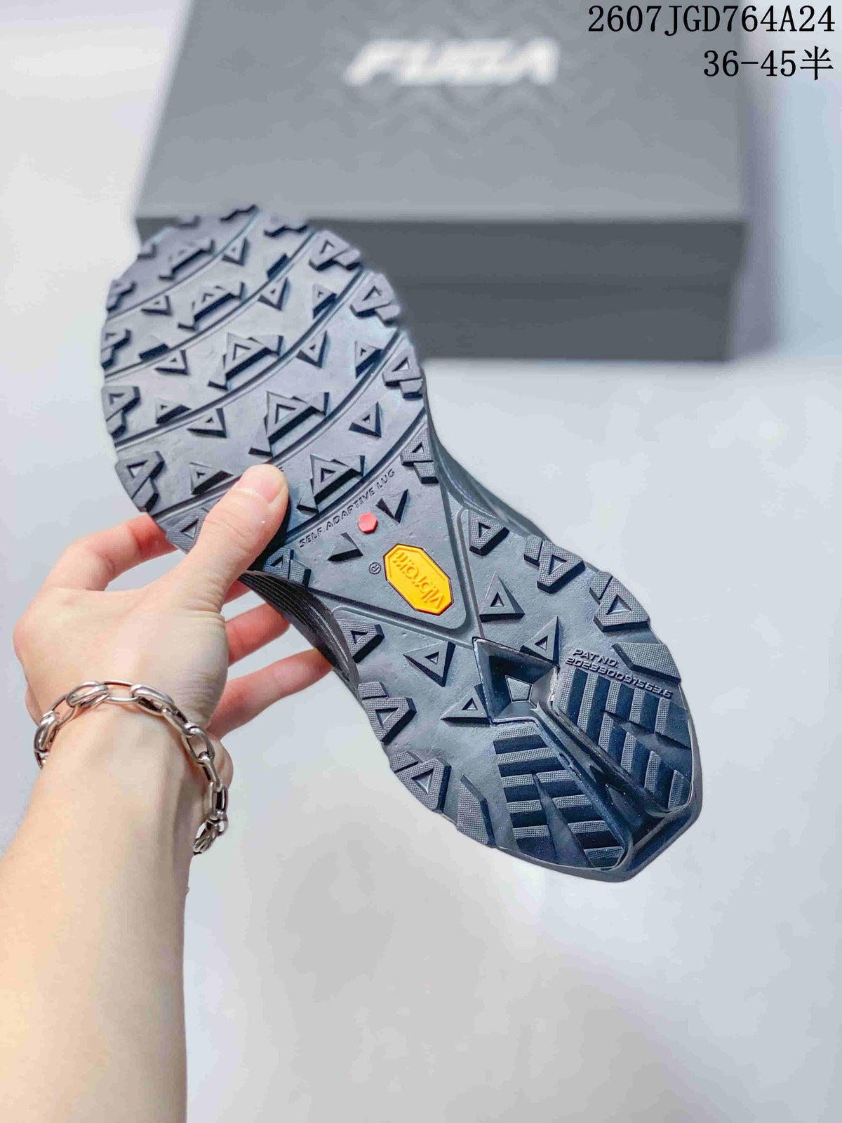 Underside of a Kailas trail shoe showing a deep lug pattern and visible Vibram outsole branding.