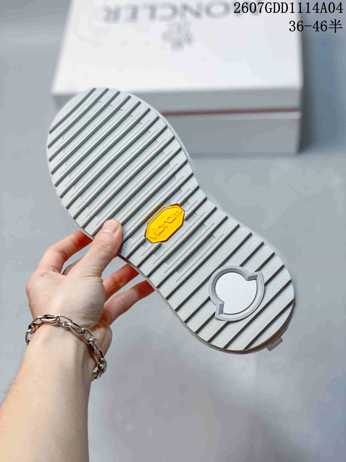 Close-up of the sneaker outsole showing a ribbed tread pattern and a yellow Vibram badge.