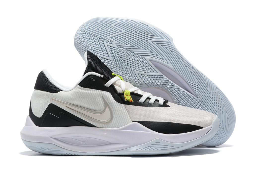 White and black basketball shoe with pale blue outsole details.