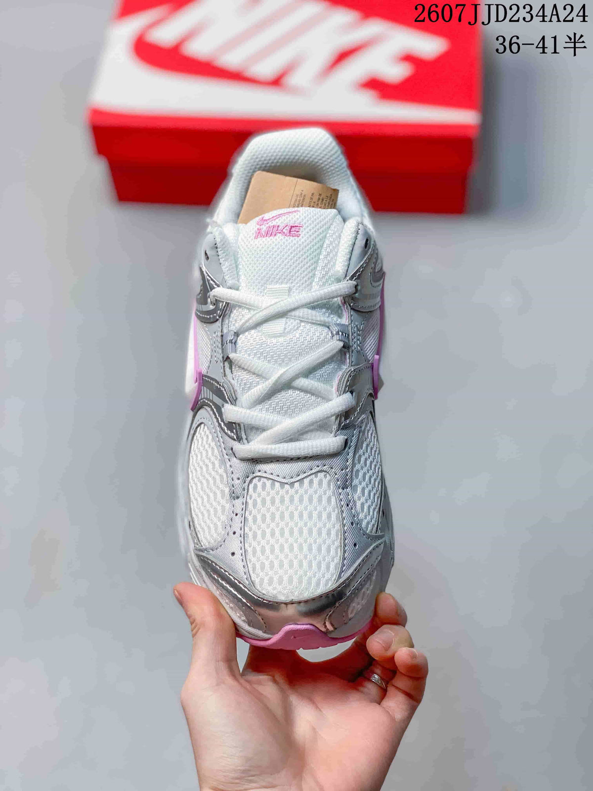 Top view of a white and silver lace-up sneaker with pink accents and mesh-style upper panels; overlay shows style code 2607JJD234A24 and sizes 36–41.5.