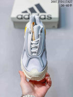 Top view showing the mesh-like tongue and upper, lace fastening, and layered toe design.