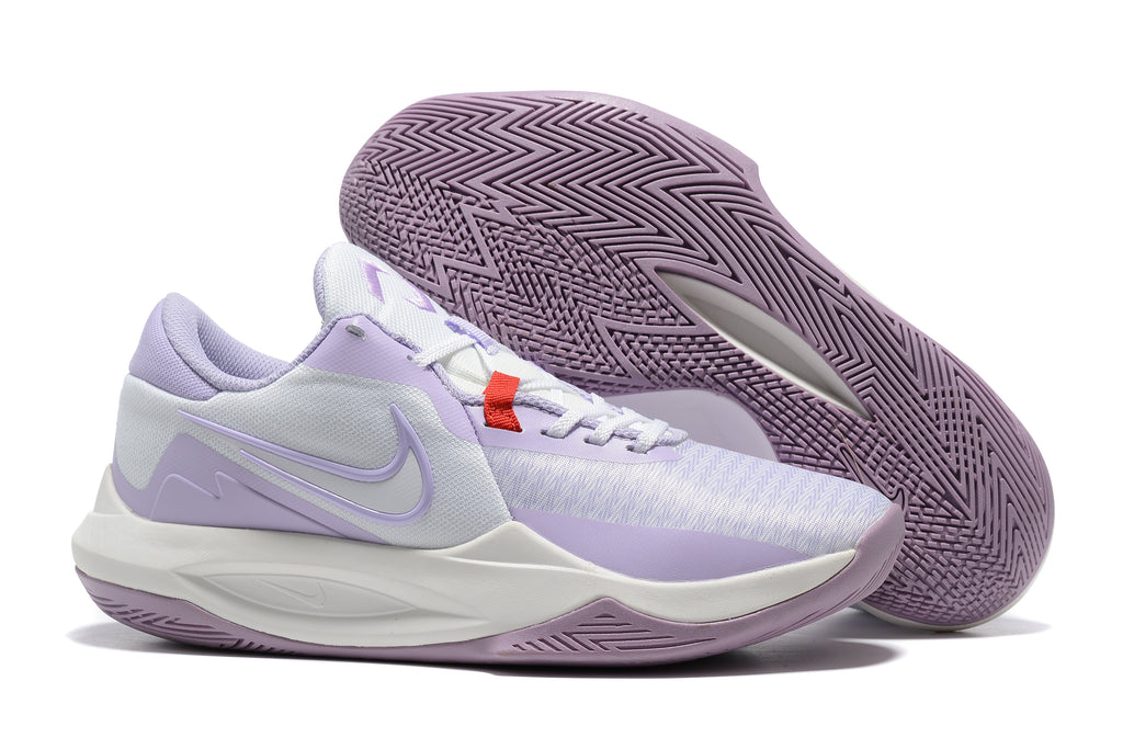 White and light purple basketball shoe with a lavender outsole.