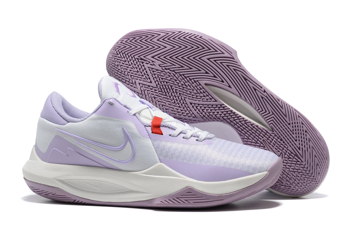 White and light purple basketball shoe with a lavender outsole.