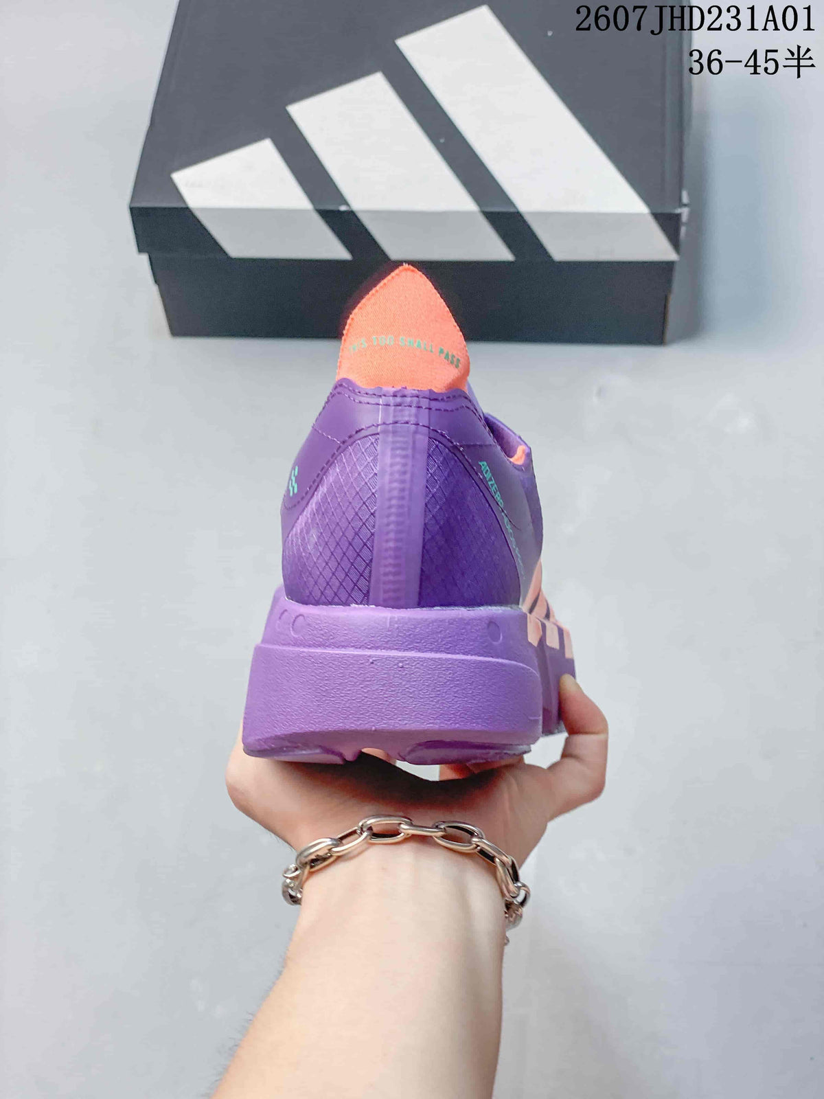 Rear view of the purple shoe with coral heel tab